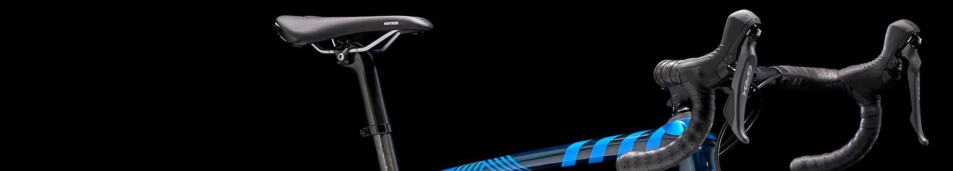 Trek FX Fahrrad mit Rennlenker, Montrose Sattel; für Stadt- und Freizeitfahrer, schwarz-blaues Design.