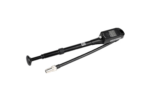 Schwarze Rockshox Dämpferpumpe mit Manometer und flexiblem Schlauch, ideal für Fahrradfederungen und -dämpfer.